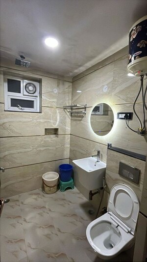 Bathroom in 3 BHK Apartment at Sector 4 Dwarka – for Rent