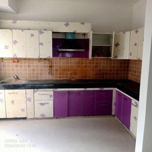 Kitchen in 2 BHK Apartment at Mahagun Mywoods, Sector 16c Greater Noida – for Rent