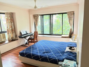 Bedroom in 1 BHK Apartment at Sanman CHS Andheri West, Andheri West – for Rent