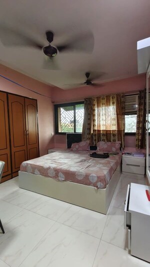Bedroom in 1 BHK Apartment at Asmita Jyoti CHS, Malad West – for Rent