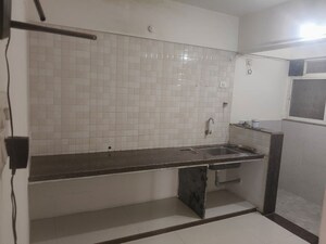 Kitchen in 2 BHK Apartment at Shree Sai Madhur Aangan, Ravet – for Rent