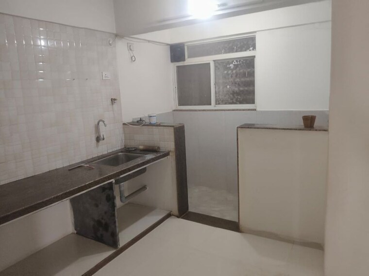 Kitchen, shree-sai-madhur-aangan 2 Bedroom 950 Sq.Ft. Apartment In Ravet Pune 10528674