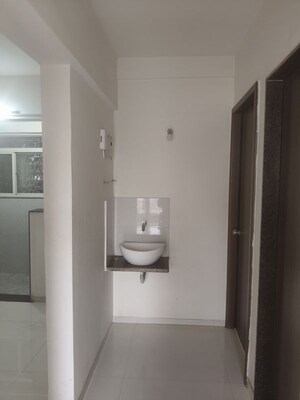 Bathroom in 2 BHK Apartment at Shree Sai Madhur Aangan, Ravet – for Rent