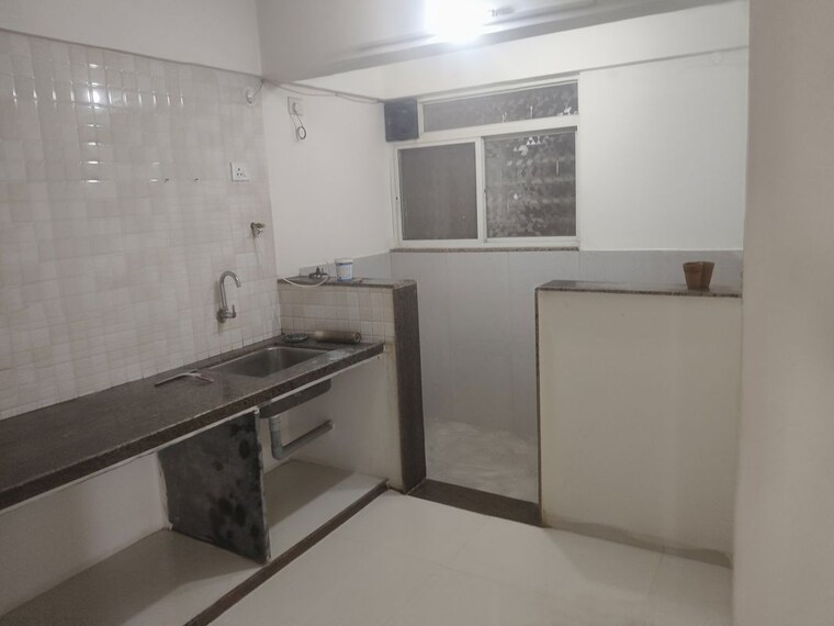 Kitchen, shree-sai-madhur-aangan 2 Bedroom 950 Sq.Ft. Apartment In Ravet Pune 10528674