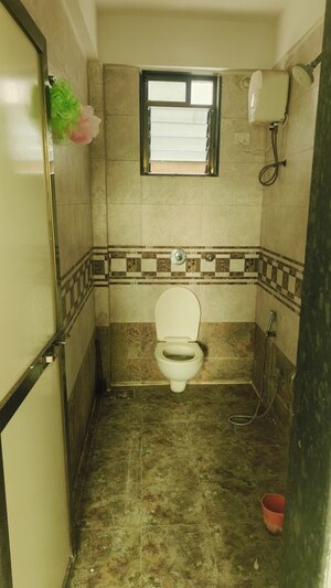Bathroom in 2 BHK Apartment at Dharti Green, Tathawade – for Rent