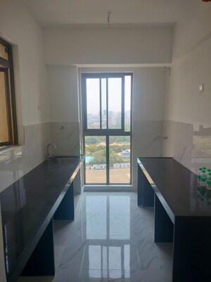 Kitchen in 3 BHK Apartment at Kalpataru Immensa, Kolshet Road – for Rent
