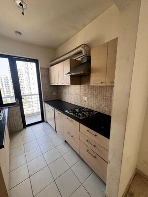 Kitchen in 4 BHK Apartment at Godrej Meridien, Sector 106 – for Rent