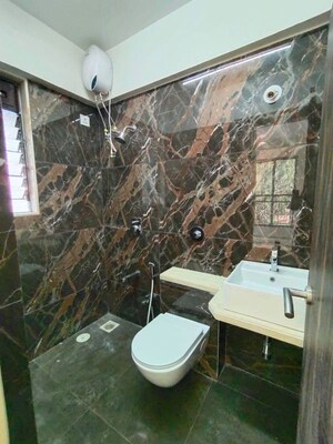 Bathroom in 2 BHK Apartment at Vardhman Grandeur, Andheri West – for Rent