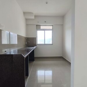 Kitchen in 2 BHK Apartment at Godrej Emerald, Ghodbunder Road – for Rent