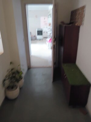 Living Room in 2 BHK Apartment at Jaypee Greens Kosmos, Sector 134 – for Rent