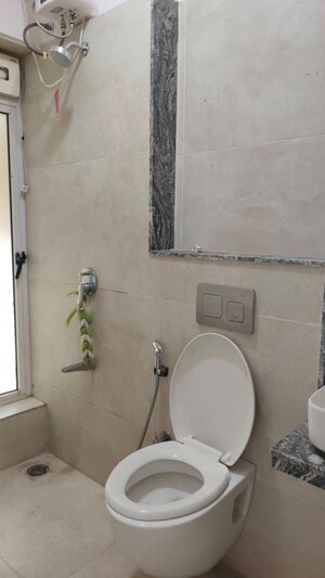 Bathroom in 2 BHK Apartment at Pratham 5TH Element, Andheri West – for Rent