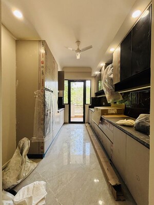 Kitchen in 4 BHK Builder Floor at Ansal API Esencia, Sector 67 – for Sale