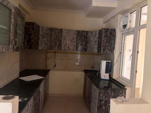 Kitchen in 3 BHK Apartment at Amrapali Silicon City, Sector 76 – for Rent