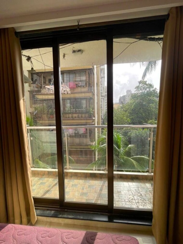 Bedroom, mukta-apartment-10th-main 2 Bedroom 800 Sq.Ft. Apartment In Khar West Mumbai 10529100