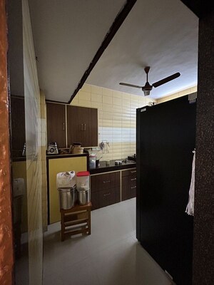 Kitchen in 2 BHK Apartment at Dosti Group Maitri Gardens, Oswal Park – for Sale