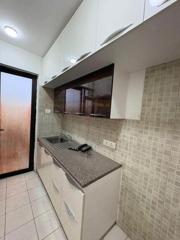 Kitchen, signature-global-golf-greens 3 Bedroom 638 Sq.Ft. Apartment In Sector 79 Gurgaon 10529279