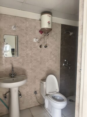 Bathroom in 2 BHK Apartment at JKG Palm Resort, Raj Nagar Extension – for Rent