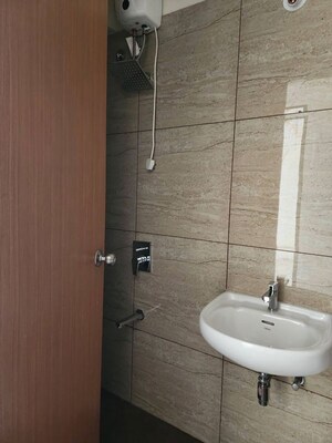Bathroom in 2 BHK Apartment at Chandak 34 Park Estate, Goregaon West – for Rent