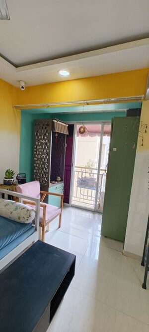 Living Room in 2 BHK Apartment at Bharat Ecovistas, Shilphata – for Sale