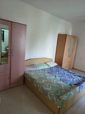 Bedroom in 3 BHK Apartment at Mahindra Woods Pinnacle, Wakad – for Rent