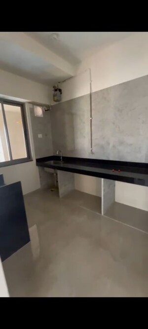 Kitchen in 2 BHK Apartment at Sheth Auris Bliss, Malad West – for Rent