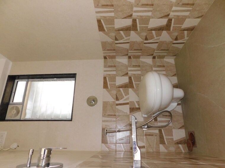 Washroom, omkar-chs-mulund 2 Bedroom 620 Sq.Ft. Apartment In Mulund East Mumbai 10529422