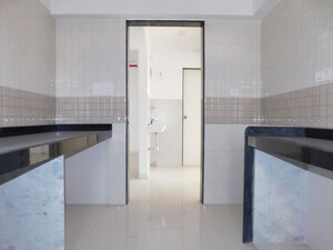 Kitchen in 2 BHK Apartment at Omkar CHS Mulund, Mulund East – for Sale