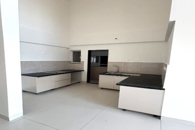 Kitchen, gera-planet-of-joy 2 Bedroom 792 Sq.Ft. Apartment In Kharadi Pune 10529478