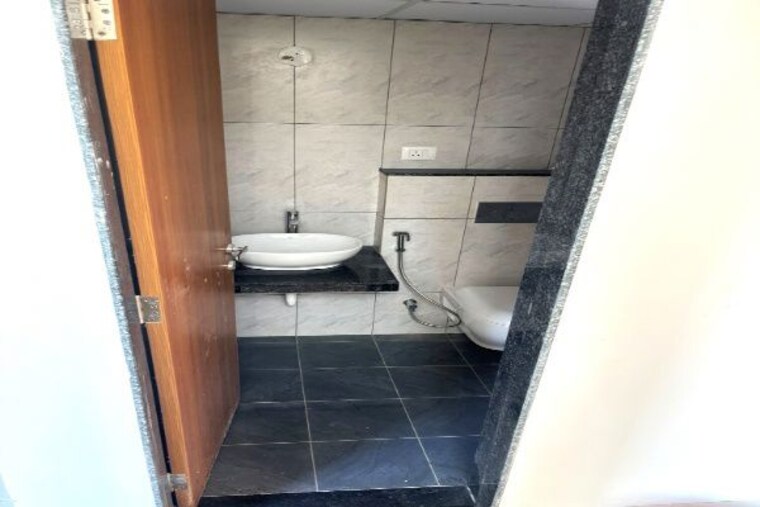 Bathroom, gera-planet-of-joy 2 Bedroom 792 Sq.Ft. Apartment In Kharadi Pune 10529478