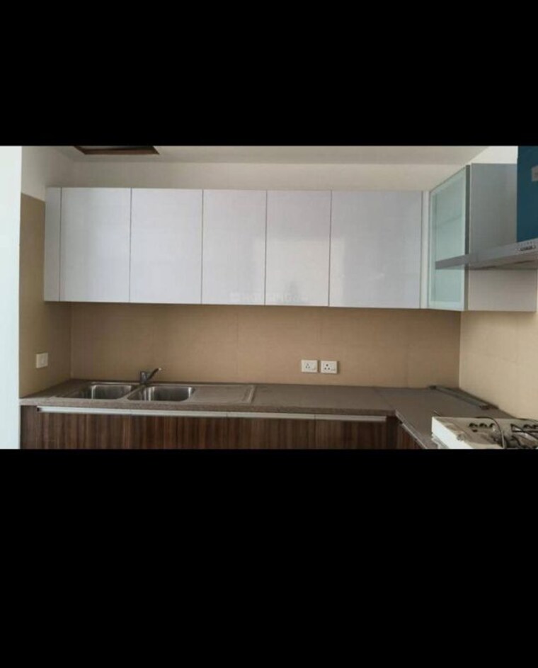 Kitchen, puri-diplomatic-greens-villas 3 Bedroom 2440 Sq.Ft. Apartment In Sector 111 Gurgaon 10529524