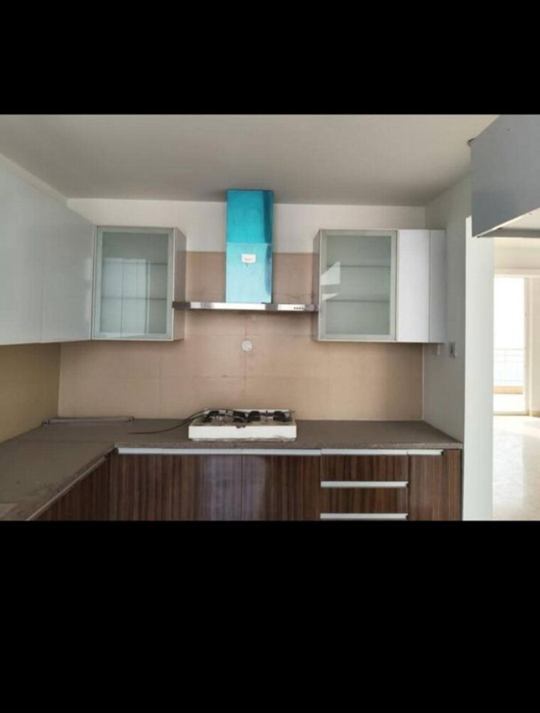 Kitchen, puri-diplomatic-greens-villas 3 Bedroom 2440 Sq.Ft. Apartment In Sector 111 Gurgaon 10529524