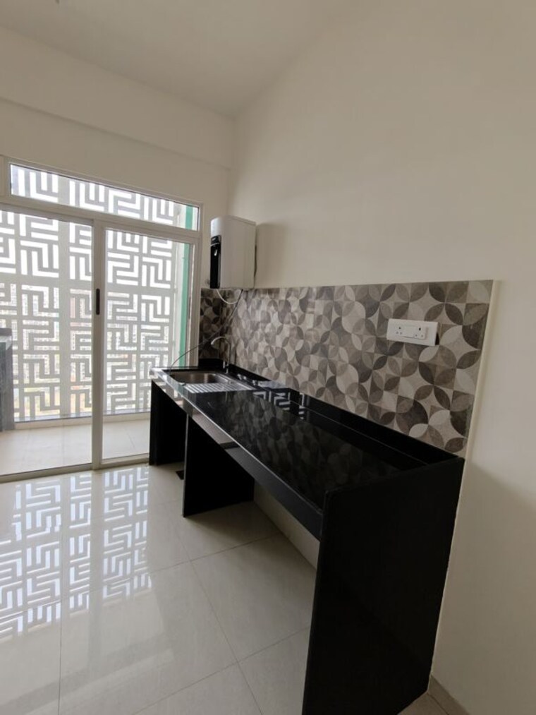 Kitchen, lodha-bella-vita 3 Bedroom 1056 Sq.Ft. Apartment In Nibm Road Pune 10529549