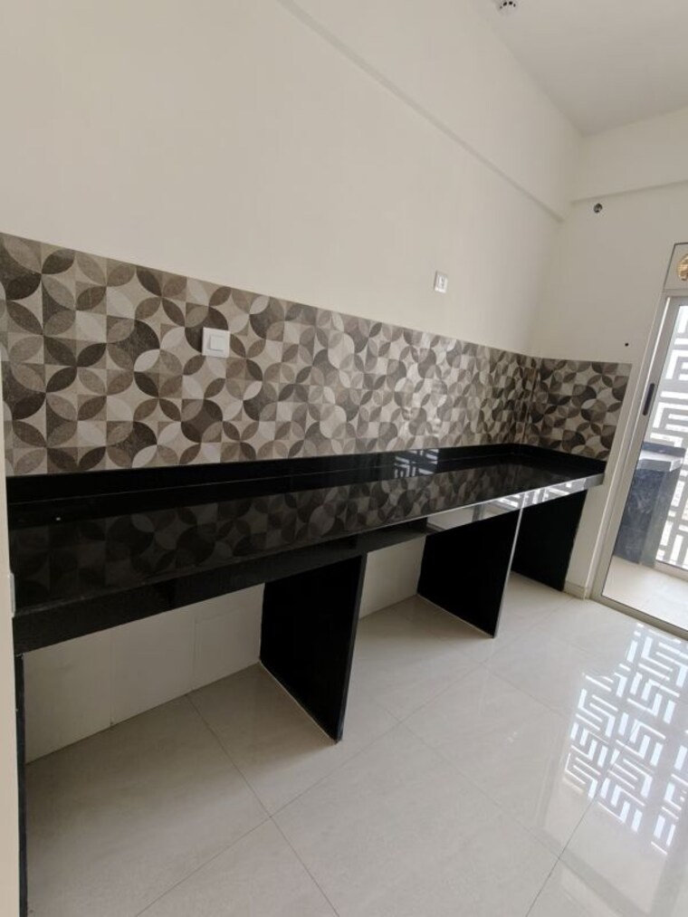 Kitchen, lodha-bella-vita 3 Bedroom 1056 Sq.Ft. Apartment In Nibm Road Pune 10529549