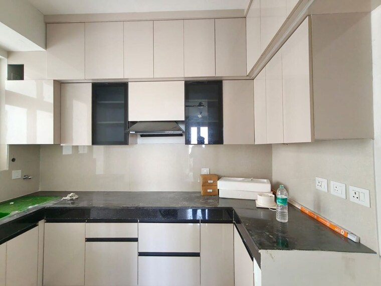 Kitchen, eldeco-live-by-the-greens 2 Bedroom 1155 Sq.Ft. Apartment In Sector 150 Noida 10529599