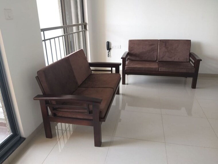 Living Room, shapoorji-pallonji-joyville-hinjewadi 2 Bedroom 780 Sq.Ft. Apartment In Hinjewadi Pune 10529598