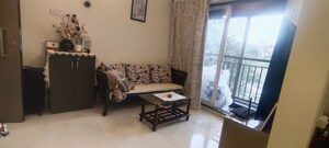 Living Room in 1 BHK Apartment at Ace Enclave, Ghodbunder Road – for Rent