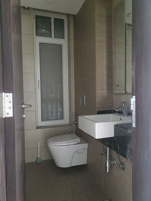Bathroom in 3 BHK Apartment at Mahindra Luminare, Sector 59 – for Rent