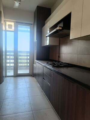 Kitchen in 3 BHK Apartment at Mahindra Luminare, Sector 59 – for Rent