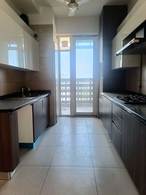 Kitchen in 3 BHK Apartment at Mahindra Luminare, Sector 59 – for Rent