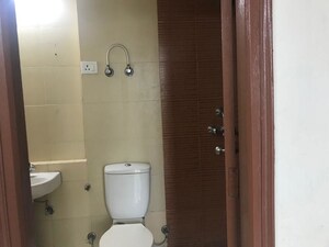 Bathroom in 2 BHK Apartment at Mahagun My Woods, Sector 16c Greater Noida – for Rent