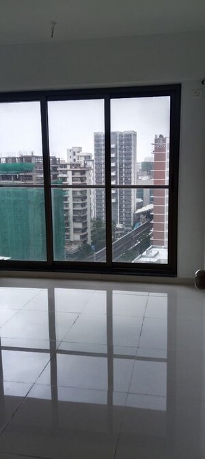 Bathroom in 4 BHK Apartment at Naman Habitat, Andheri West – for Sale