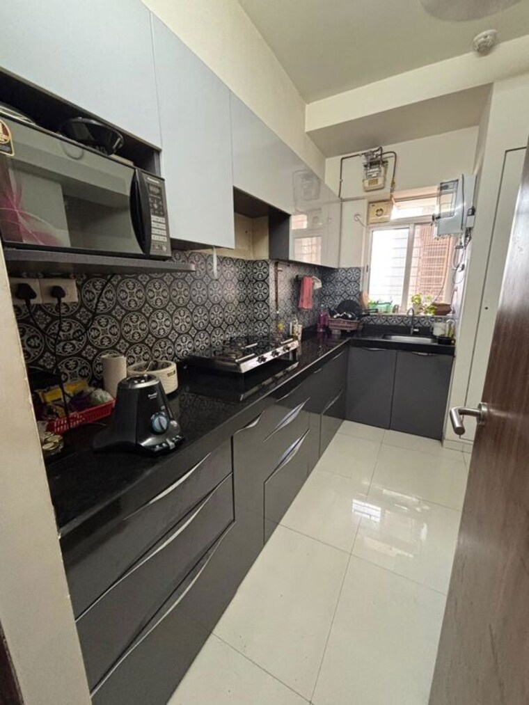 Kitchen, lodha-amara 2 Bedroom 672 Sq.Ft. Apartment In Kolshet Road Thane 10529849