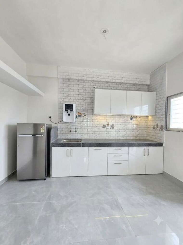 Kitchen, nirmala-apartments-wadgaon-sheri 1 Bedroom 584 Sq.Ft. Builder Floor In Wadgaon Sheri Pune 10530045