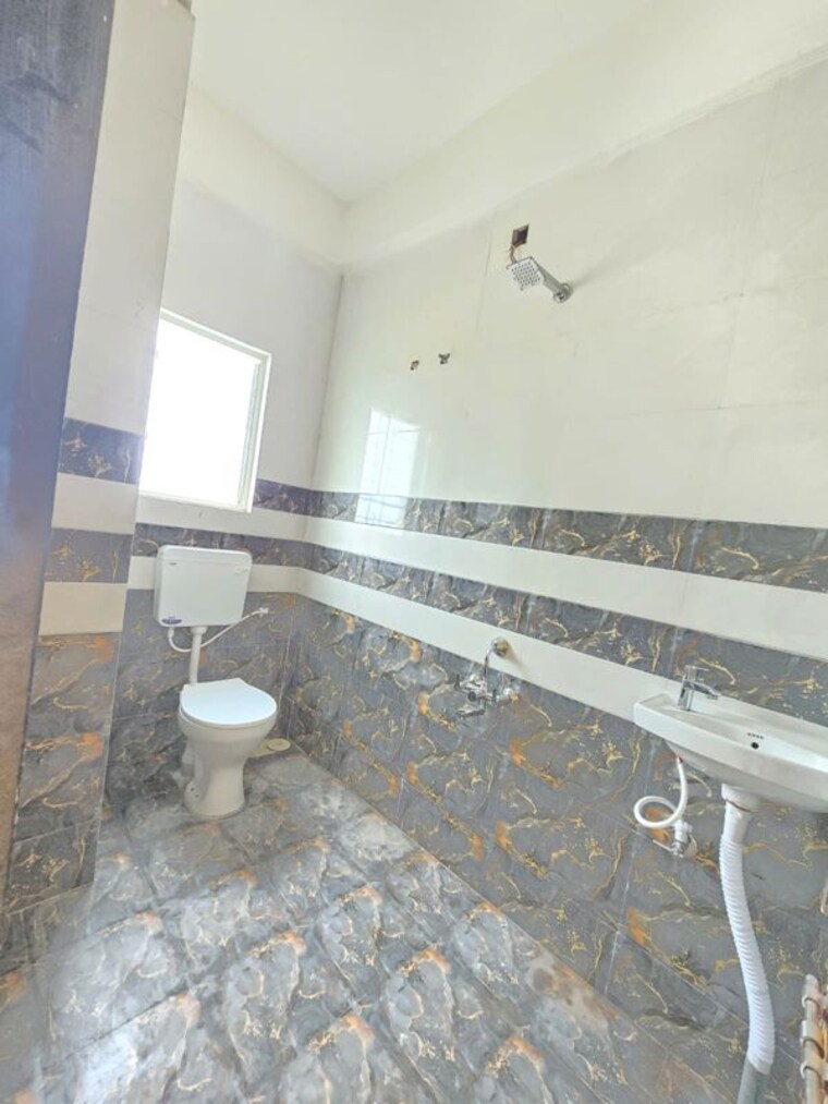 Bathroom, nirmala-apartments-wadgaon-sheri 1 Bedroom 584 Sq.Ft. Builder Floor In Wadgaon Sheri Pune 10530045
