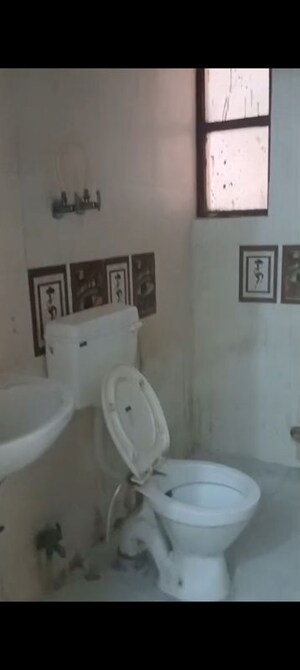 Bathroom in 2 BHK Apartment at Nitishree Aura Chimera, Raj Nagar Extension – for Sale