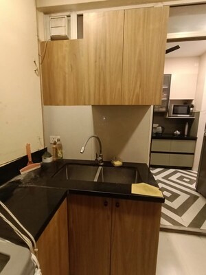 Kitchen in 2.5 BHK Apartment at Godrej 101, Sector 79 – for Rent