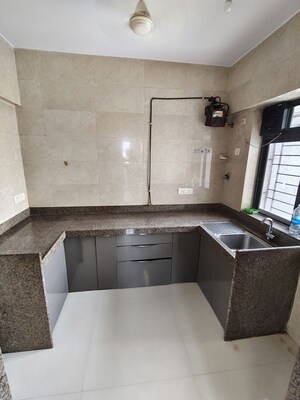 Kitchen in 1.5 BHK Apartment at Sunteck Gilbird, Andheri West – for Rent