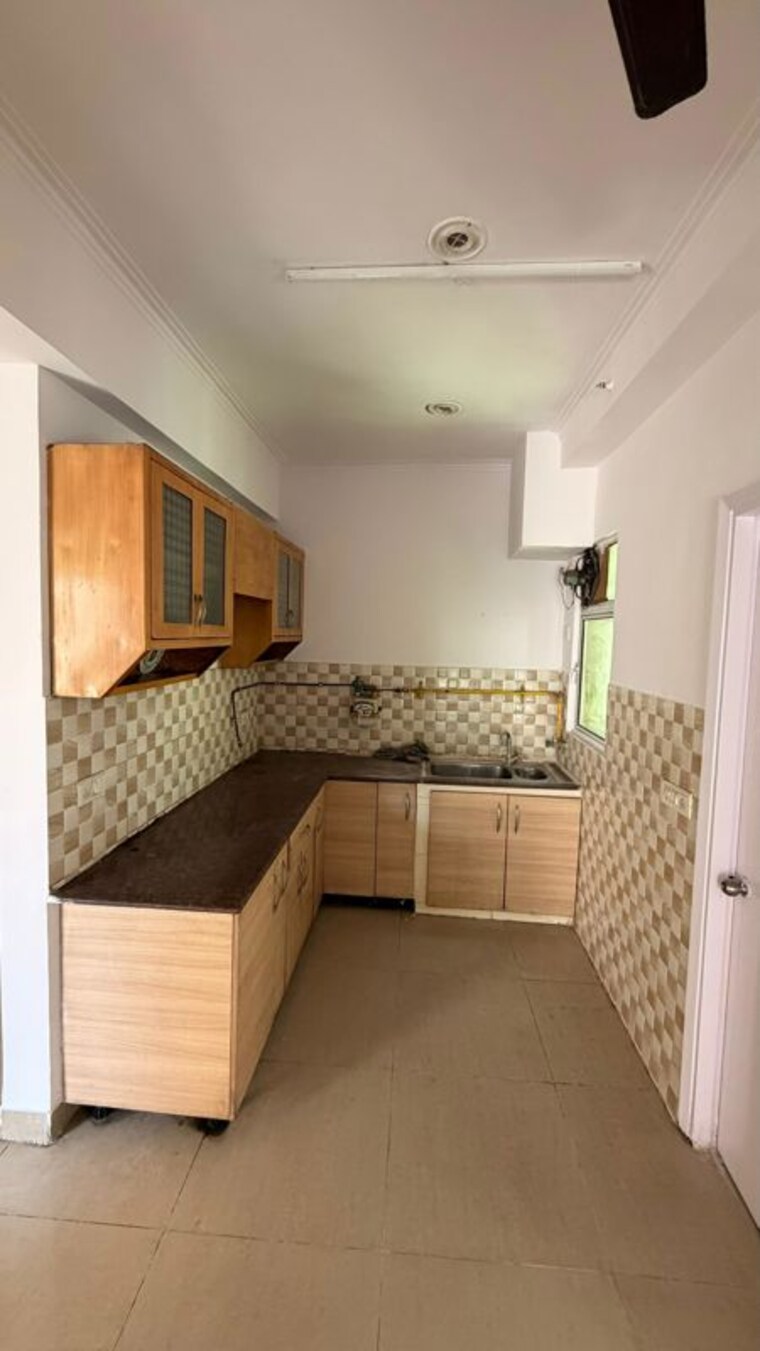 Kitchen, amrapali-silicon-city 2.5 Bedroom 1180 Sq.Ft. Apartment In Sector 76 Noida 10530492