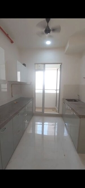 Kitchen in 2 BHK Apartment at Piramal Vaikunth, Balkum Pada – for Rent