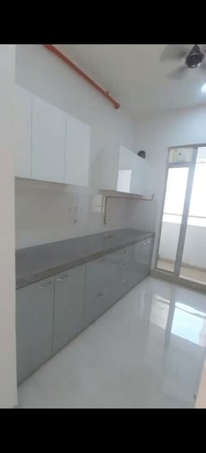 Kitchen in 2 BHK Apartment at Piramal Vaikunth, Balkum Pada – for Rent